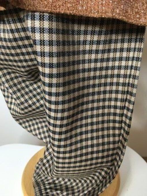 Ensemble bébé pantalon à carreaux et tunique de couleur brique.