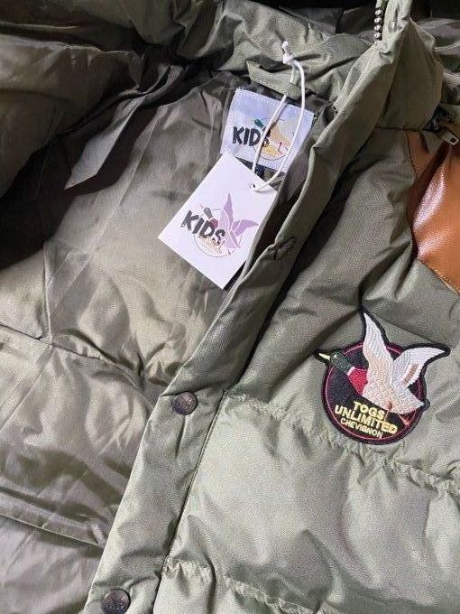 Parka Doudoune Chevignon kaki avec capuche détachable.